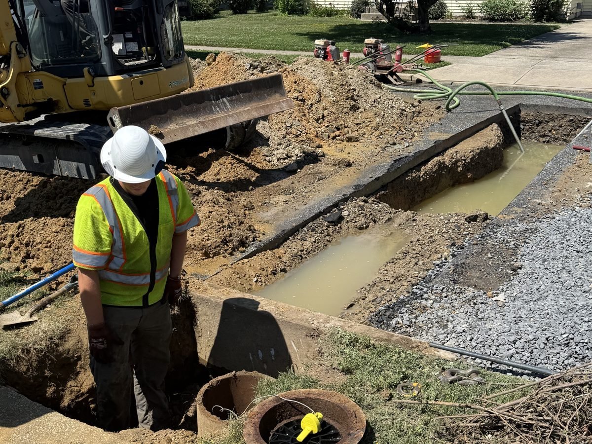 ETS crew repairing an underground utility line